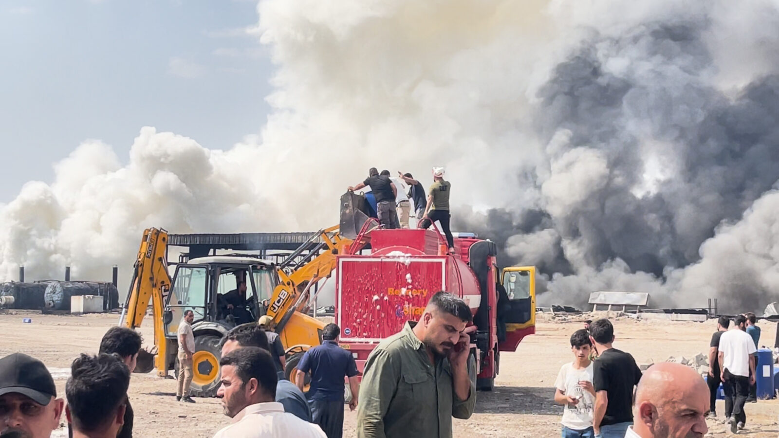 شاهد المصفى بعد إخماد النيران.. 24 مصابا من منتسبي الدفاع المدني في أربيل